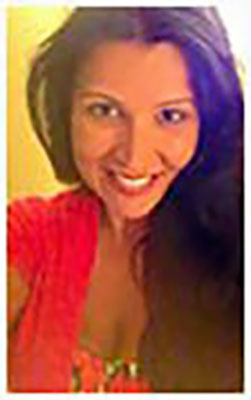 A picture of me wearing a red top and i have brown hair